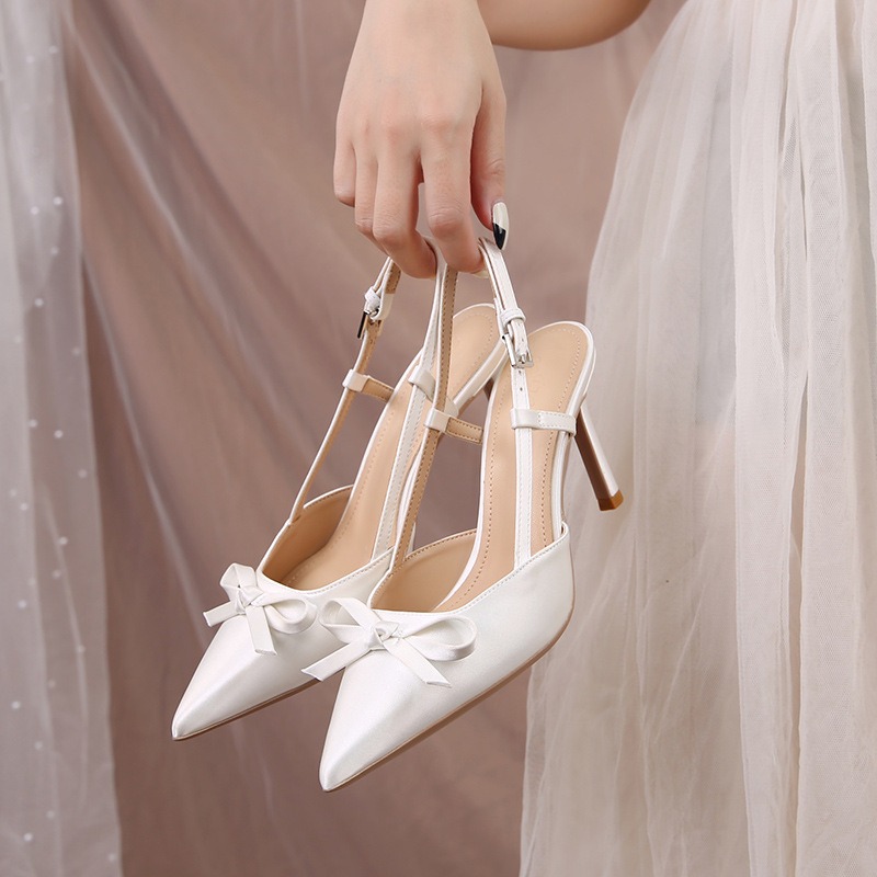 white heels with bows